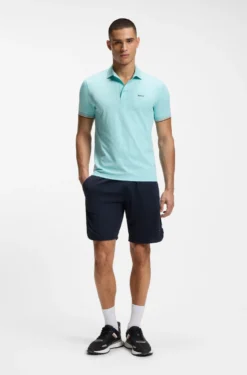 Active Slim-Fit Poloshirt mit geprägtem Tennisball-Muster