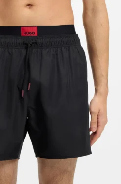 Badeshorts mit doppeltem Bund und Logo-Details
