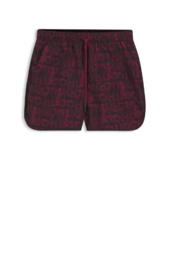 Badeshorts mit saisonalem Print und abgerundetem Saum