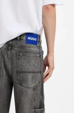 Baggy-Fit Jeans in Schwarz mit Carpenter-Details