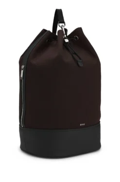 Canvas-Beuteltasche mit Besätzen in Leder-Optik