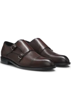 Doppelte Monkstraps aus Leder mit perforiertem Detail