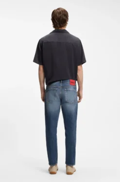 Dunkelblaue Tapered-Fit Jeans aus Stretch-Baumwolle