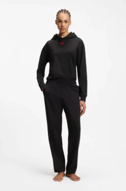 Jogginghose aus Stretch-Jersey mit rotem Logo-Label