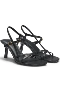 Ledersandalen mit asymmetrischem Absatz und Riemen