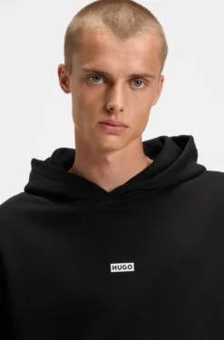 Loose-Fit Hoodie aus Baumwoll-Terry mit Logo-Details