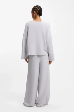 Loose-Fit Sweatshirt aus Baumwoll-Mix mit unversäuberten Säumen