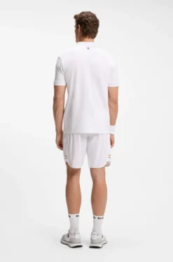 Poloshirt aus Stretch-Baumwolle mit tennisinspiriertem Logo