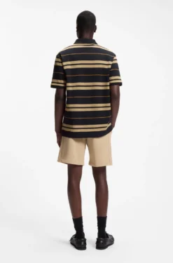 Regular-Fit Poloshirt aus Baumwoll-Piqué mit eingearbeiteten Streifen