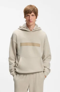 Relaxed-Fit Hoodie aus Baumwollfrottee mit weit gesetztem Logo