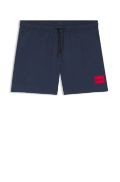 Schnell trocknende Badeshorts mit rotem Logo-Label
