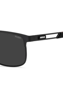 Schwarze Sonnenbrille mit Gummi-Logo