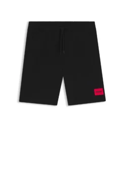 Shorts aus Baumwoll-Terry mit rotem Logo-Label