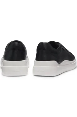 Sneakers aus Leder mit Cupsohle und roten Logo-Details