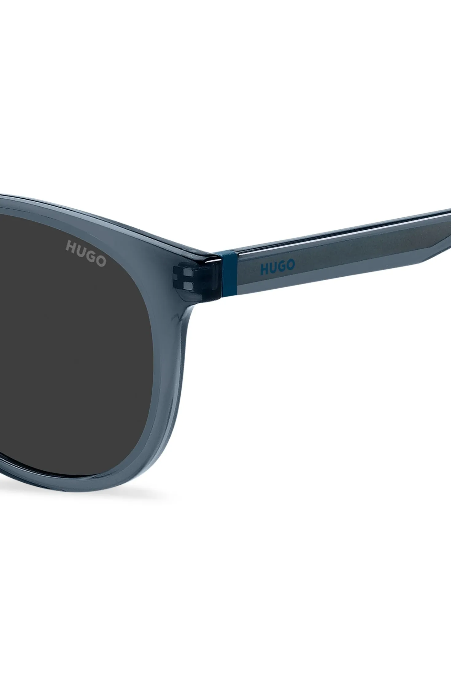 Sonnenbrille aus blauem Acetat mit Gummibesatz