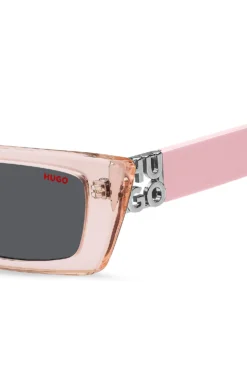 Sonnenbrille aus rosafarbenem Acetat mit 3D-Monogramm