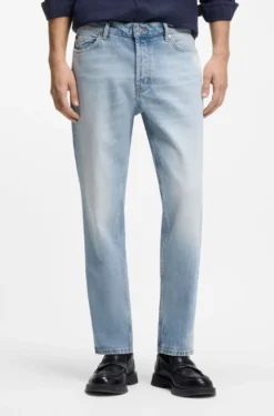 Tapered-Fit Jeans aus hellblauem, elastischem Denim