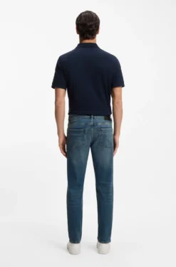 Tapered-Fit Jeans aus verwaschenem blauem Stretch-Denim