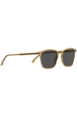 Transparente, beigefarbene Sonnenbrille mit grauen Gläsern